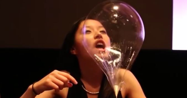 She Sucks Helium Out Of A Clear Balloon, Then Eats The WHOLE THING. The Reason Why? WHOA!