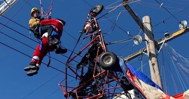 Parachuting Santa Crashes Into Power Lines!